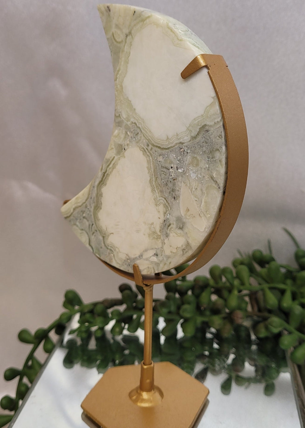Green Plume Agate Crescent Moon on Gold Stand