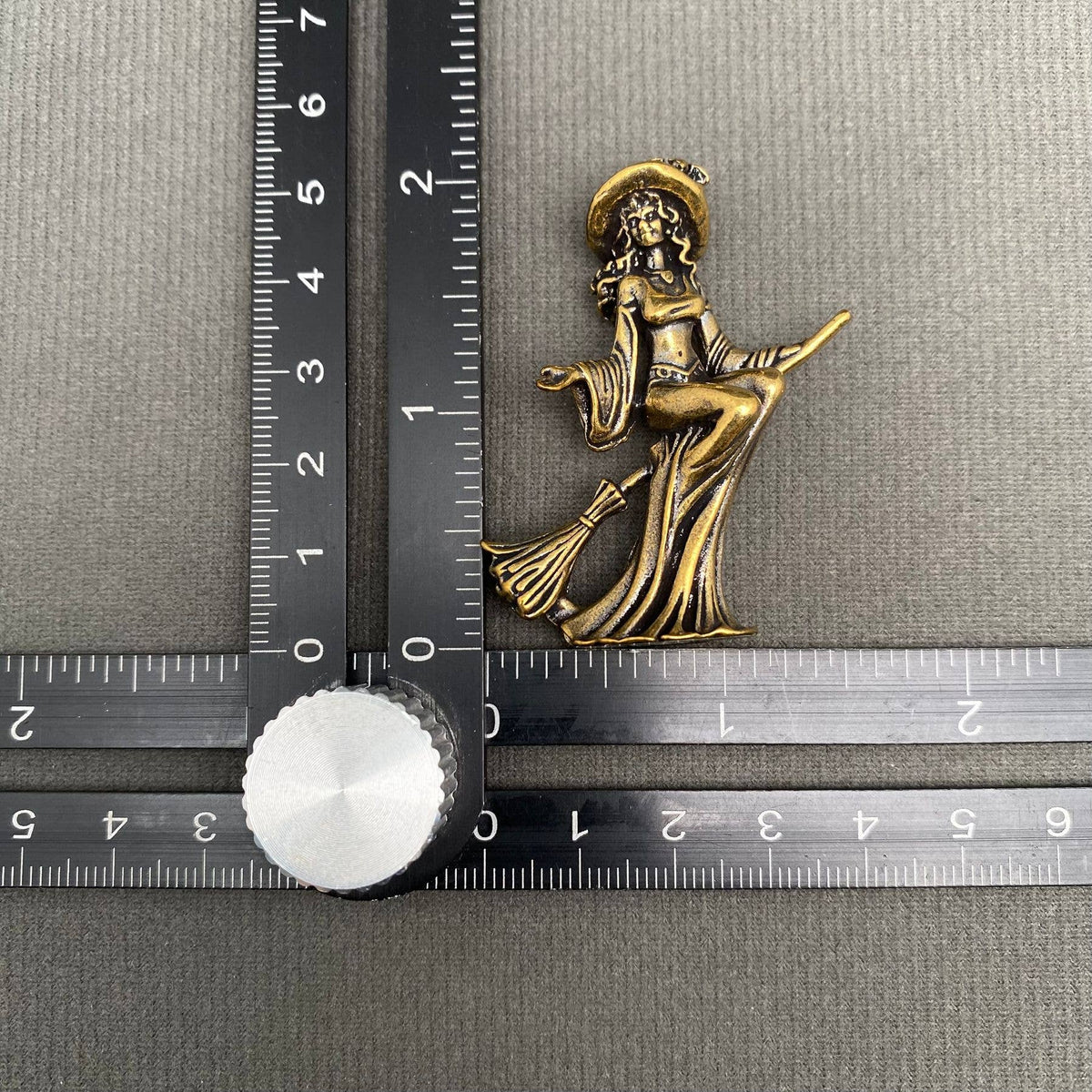 Miniature brass witch decor figurine