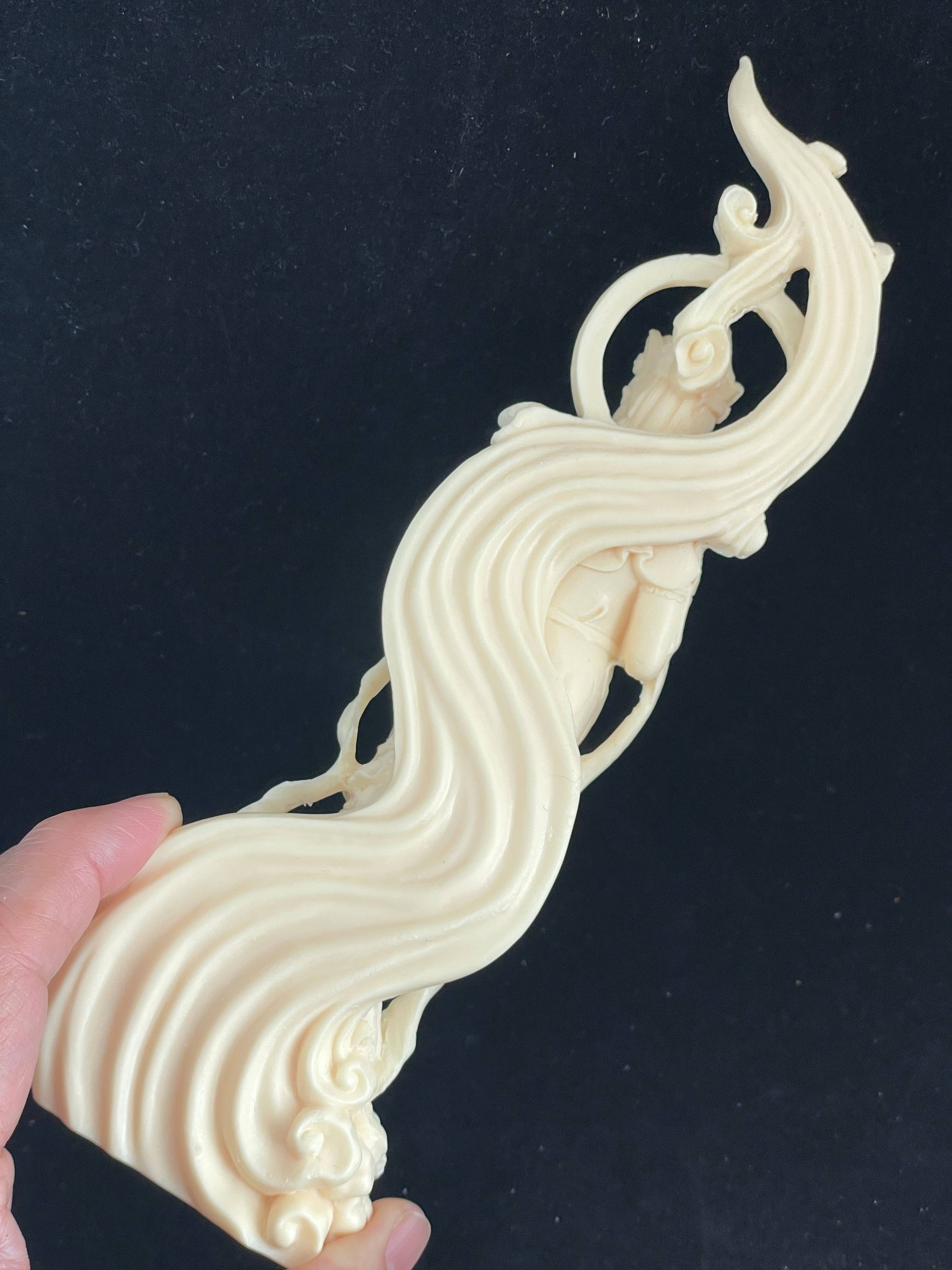 Palm nut Guan Yin on lotus and clouds 8.1"