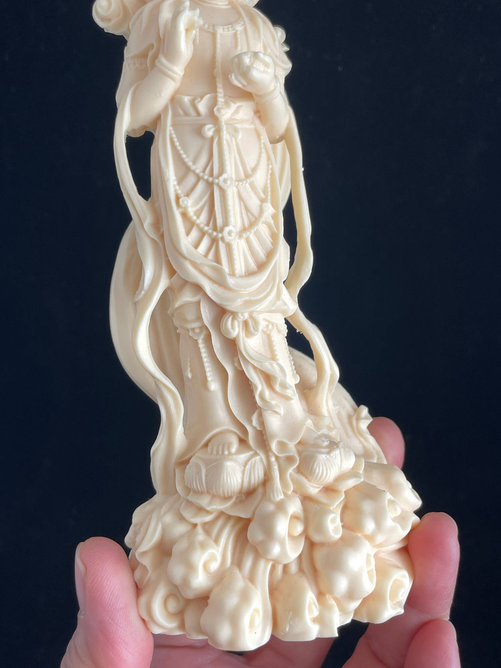 Palm nut Guan Yin on lotus and clouds 8.1"