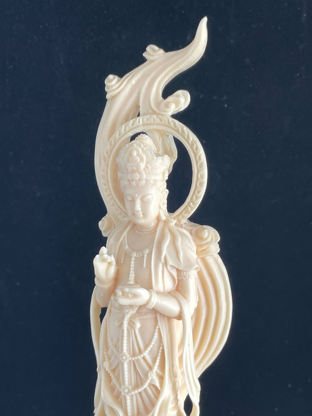 Palm nut Guan Yin on lotus and clouds 8.1"