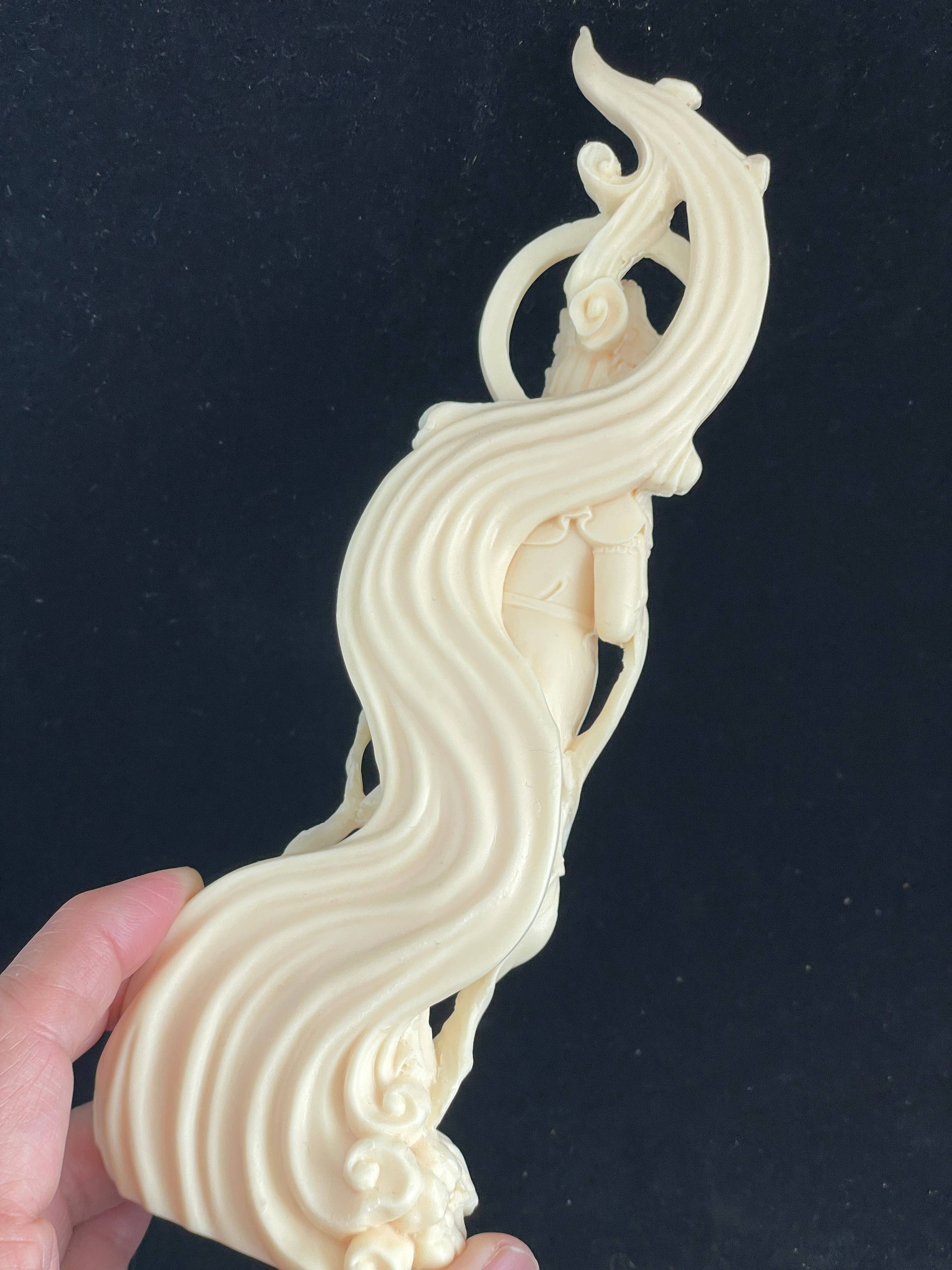 Palm nut Guan Yin on lotus and clouds 8.1"