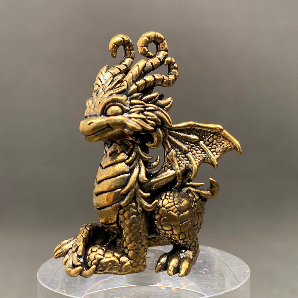 Miniature brass dragon figurine
