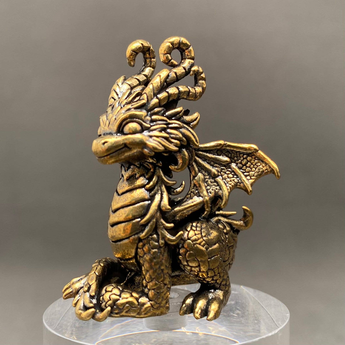 Miniature brass dragon figurine