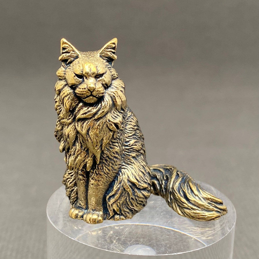 Miniature brass cat figurine